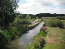 The recently restored (2001) aqueduct carries the Wey and Arun junction canal over the river Lox
